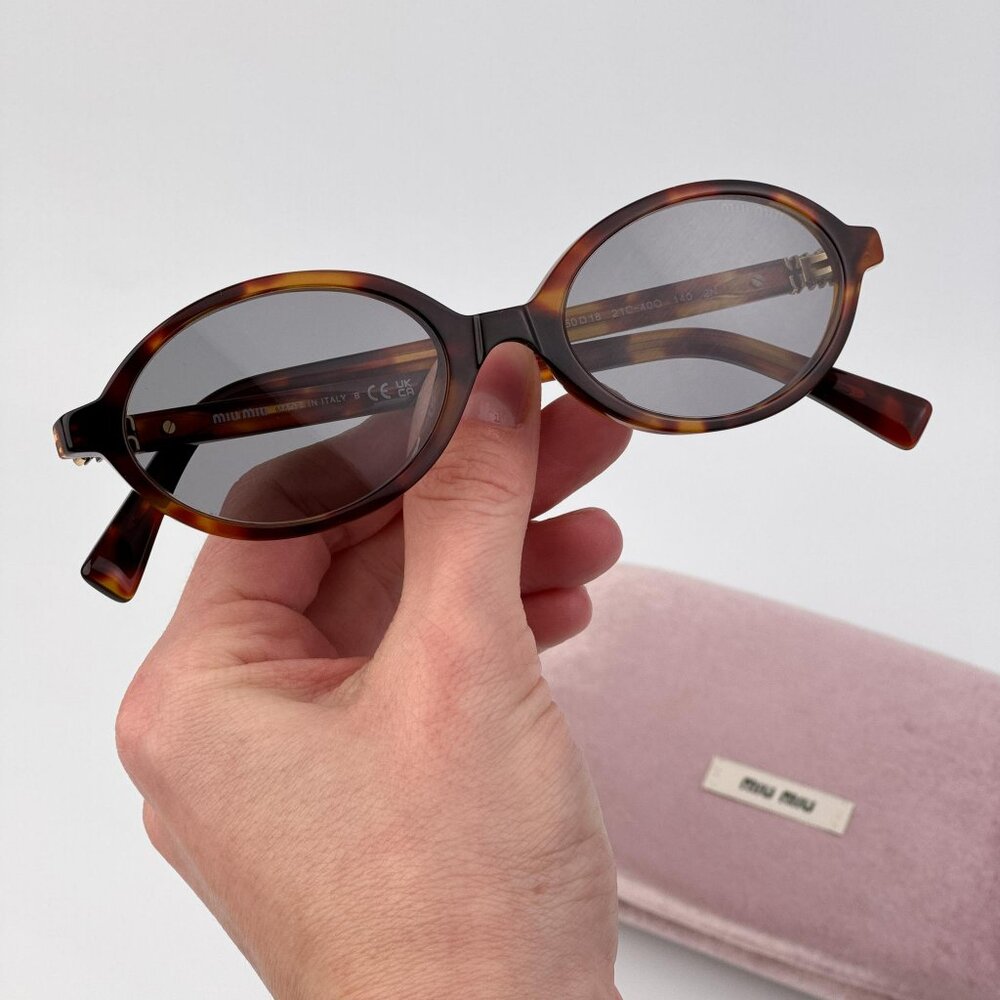 Miu Miu REGARD Women’s Oval Sunglasses – Havana Grey Model MU04ZS 21C40O